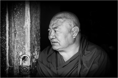 Tibetan Monk in a Doorframe.jpg